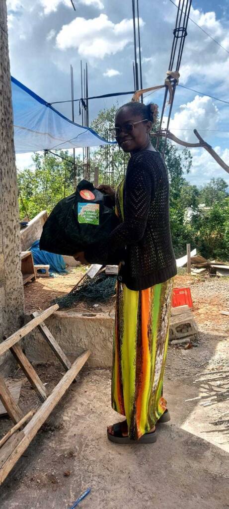 Tracey Edwards delivering aid packages in Jamaica